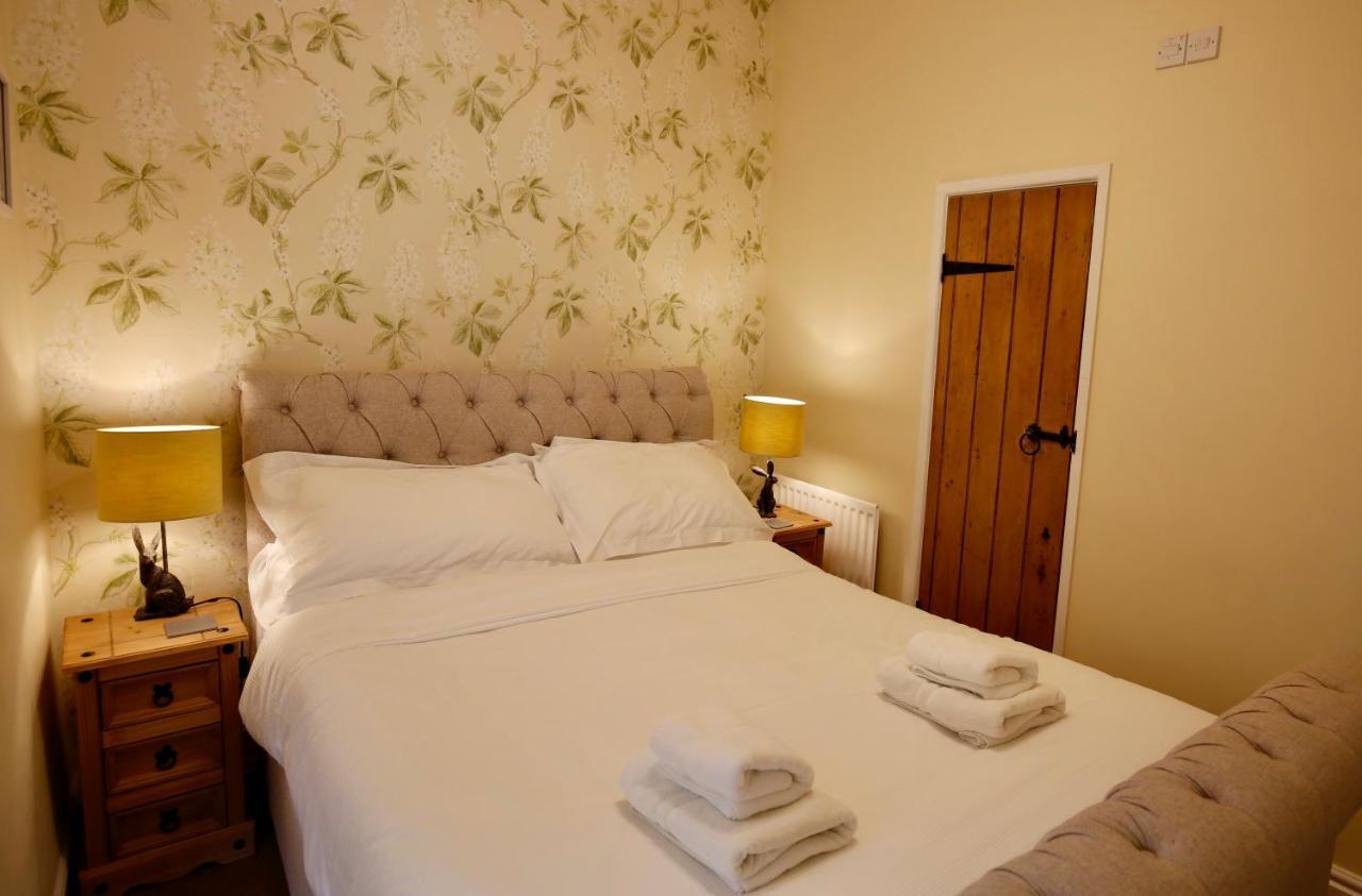 Ashfield House Hotel Grassington Cameră foto A bedroom at the Old Post Office