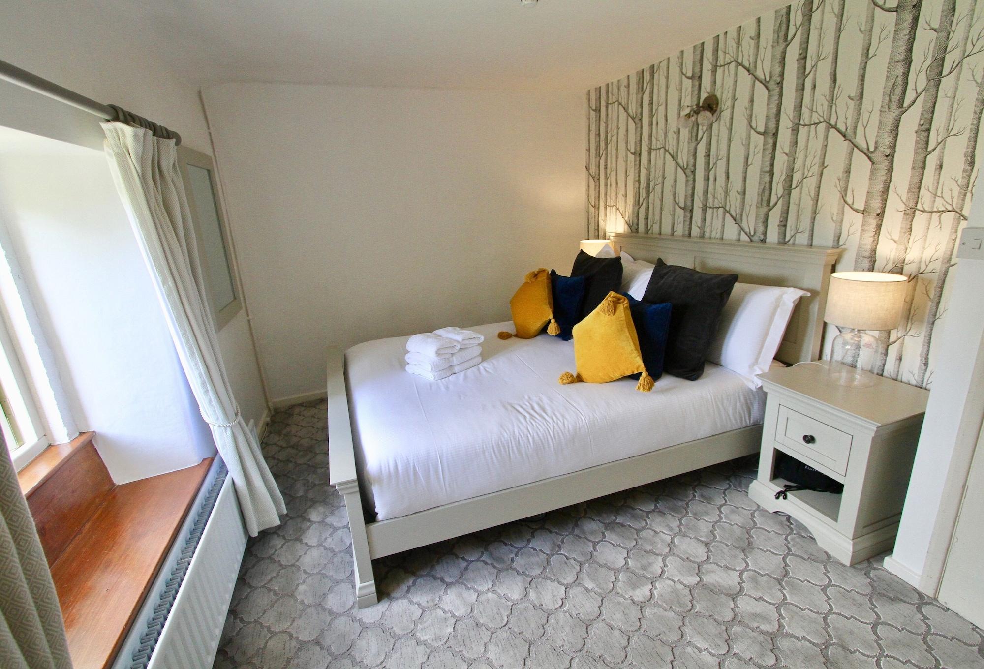 Ashfield House Hotel Grassington Exterior foto A bedroom at The Old Inn