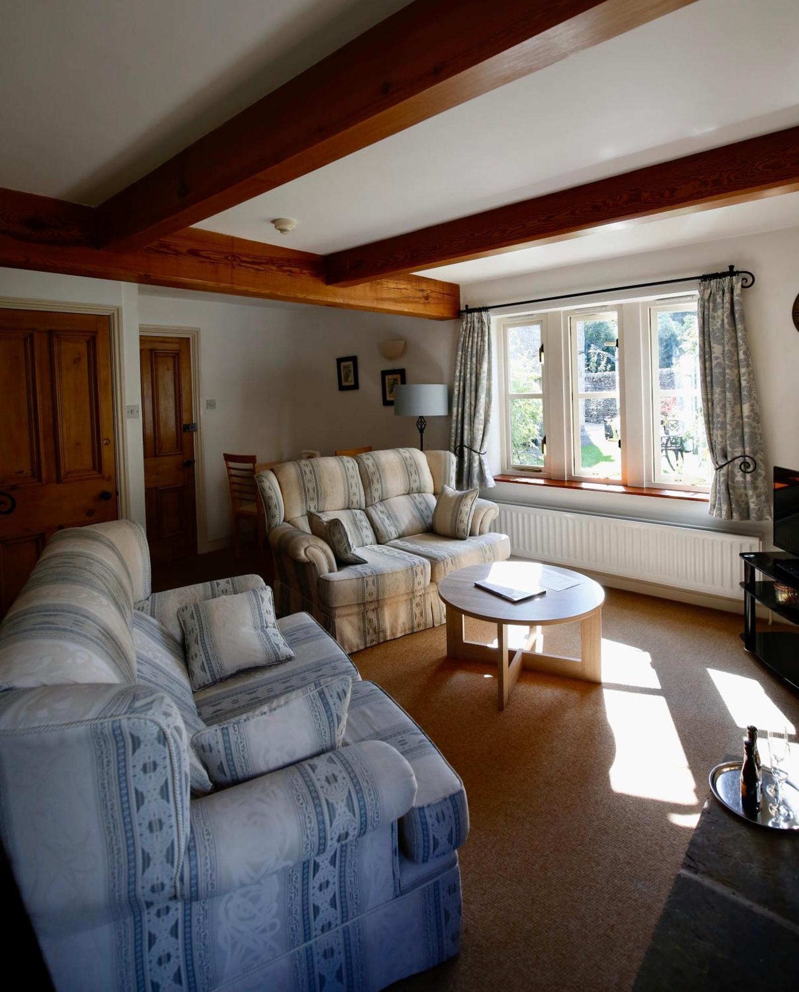 Ashfield House Hotel Grassington Cameră foto The living room at The Old School House